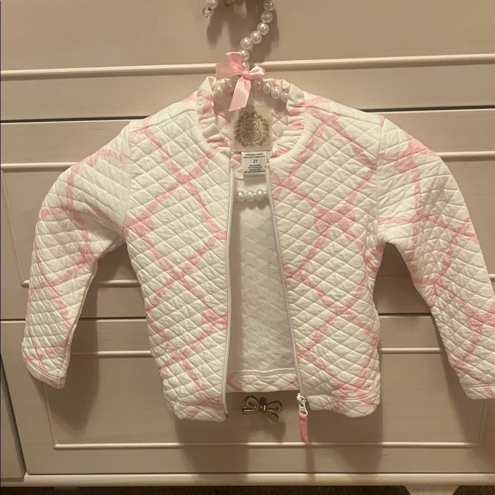 Chic Quilted Jacket with Pink Accents